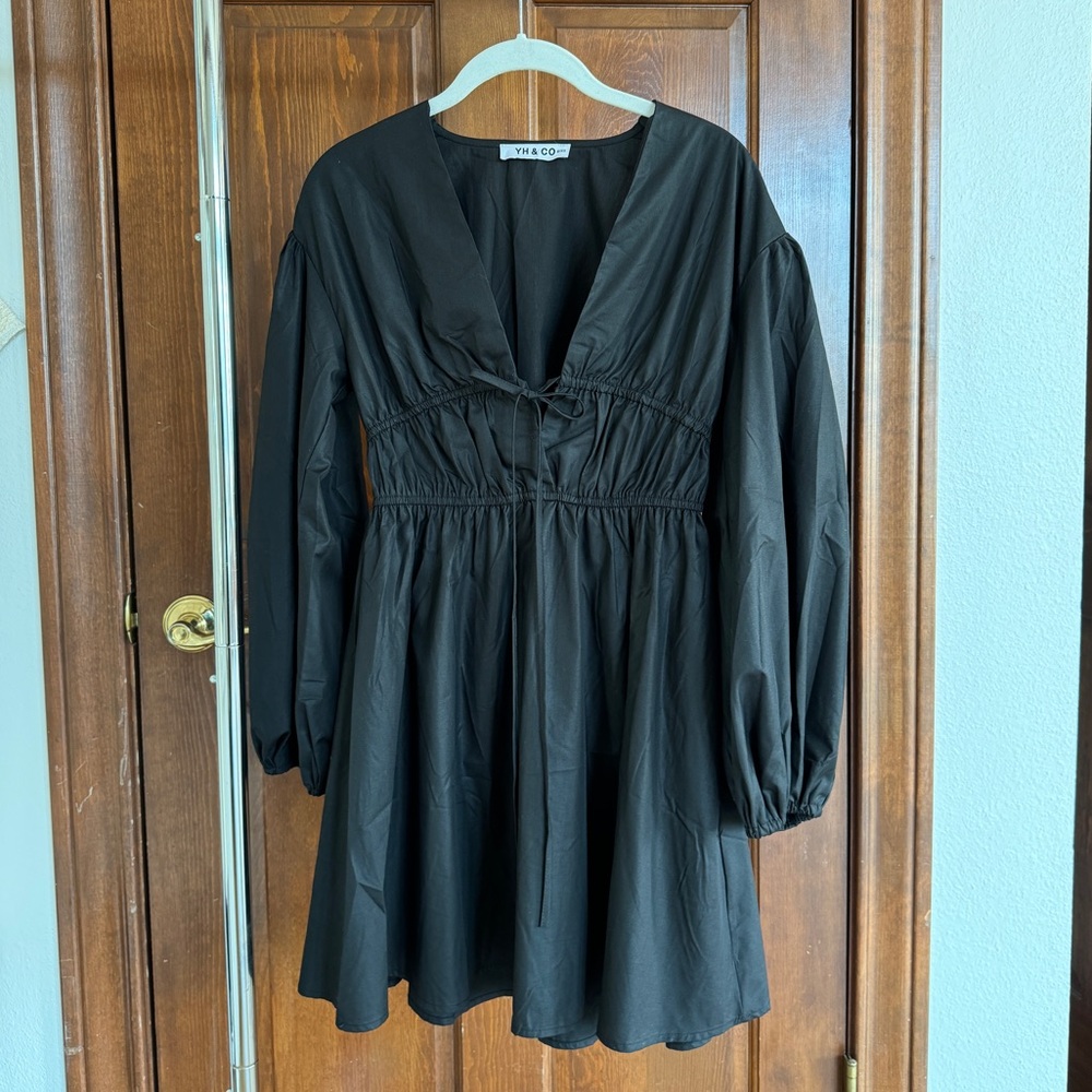 Black mini dress with front tie from Showpo. Never worn. Size XS